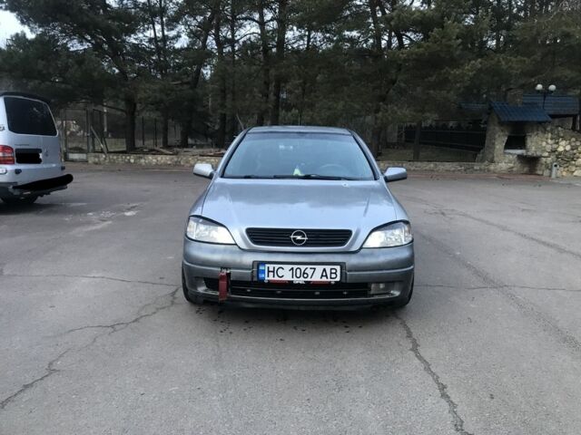 Серый Опель Астра, объемом двигателя 1.4 л и пробегом 400 тыс. км за 1750 $, фото 1 на Automoto.ua