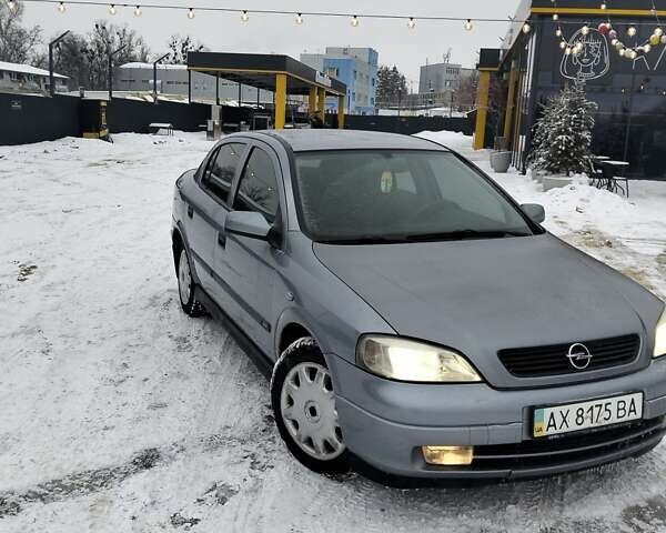 Серый Опель Астра, объемом двигателя 1.6 л и пробегом 264 тыс. км за 3650 $, фото 1 на Automoto.ua