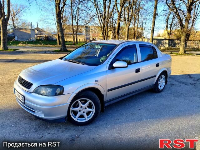 Серый Опель Астра, объемом двигателя 1.6 л и пробегом 292 тыс. км за 4200 $, фото 1 на Automoto.ua