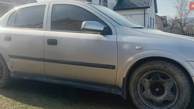 Сірий Опель Астра, об'ємом двигуна 1.4 л та пробігом 249 тис. км за 3100 $, фото 1 на Automoto.ua