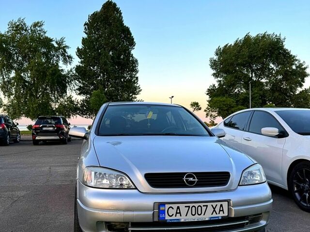 Серый Опель Астра, объемом двигателя 1.4 л и пробегом 253 тыс. км за 3500 $, фото 1 на Automoto.ua