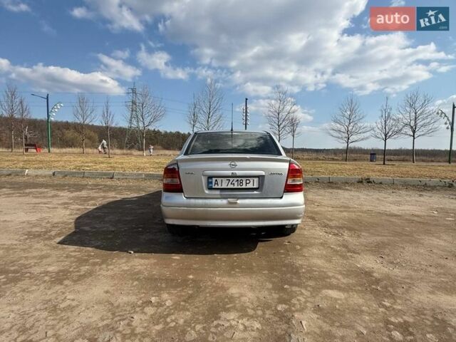 Серый Опель Астра, объемом двигателя 1.6 л и пробегом 291 тыс. км за 1800 $, фото 1 на Automoto.ua