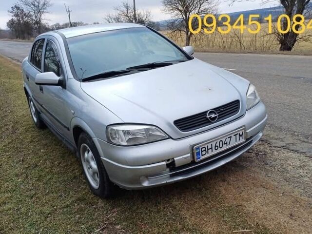 Серый Опель Астра, объемом двигателя 1.4 л и пробегом 300 тыс. км за 1000 $, фото 1 на Automoto.ua