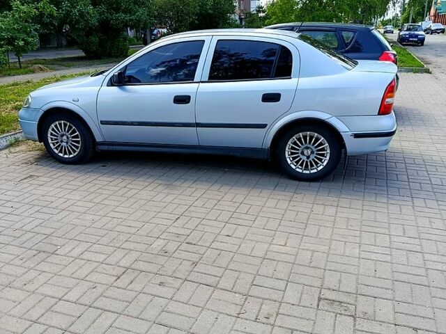 Серый Опель Астра, объемом двигателя 1.4 л и пробегом 246 тыс. км за 3500 $, фото 1 на Automoto.ua