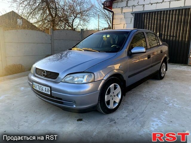 Серый Опель Астра, объемом двигателя 1.6 л и пробегом 265 тыс. км за 2999 $, фото 1 на Automoto.ua