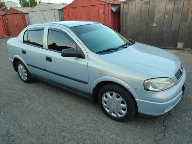 Серый Опель Астра, объемом двигателя 1.4 л и пробегом 180 тыс. км за 6400 $, фото 1 на Automoto.ua