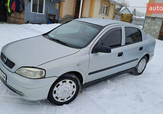 Сірий Опель Астра, об'ємом двигуна 1.6 л та пробігом 231 тис. км за 2400 $, фото 1 на Automoto.ua