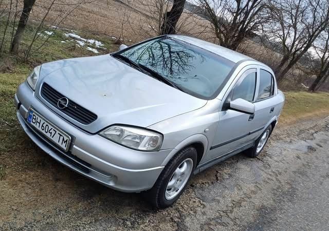 Серый Опель Астра, объемом двигателя 1.4 л и пробегом 280 тыс. км за 1000 $, фото 1 на Automoto.ua