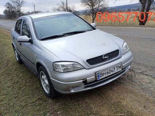 Серый Опель Астра, объемом двигателя 1.4 л и пробегом 322 тыс. км за 1100 $, фото 1 на Automoto.ua