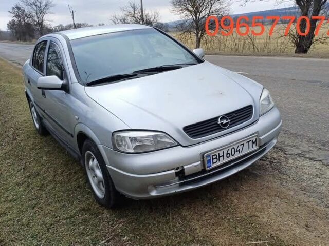 Серый Опель Астра, объемом двигателя 1.4 л и пробегом 300 тыс. км за 1100 $, фото 1 на Automoto.ua