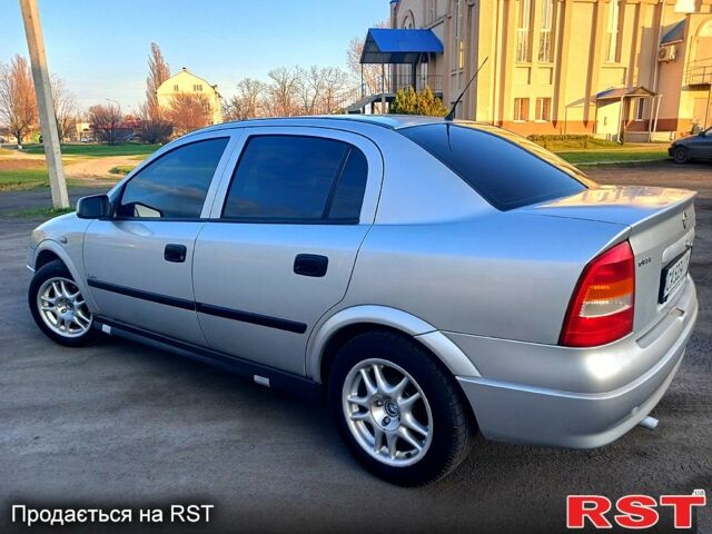 Серый Опель Астра, объемом двигателя 1.6 л и пробегом 347 тыс. км за 3300 $, фото 1 на Automoto.ua