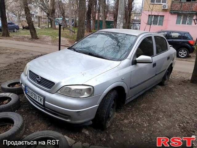Серый Опель Астра, объемом двигателя 1.4 л и пробегом 175 тыс. км за 2450 $, фото 1 на Automoto.ua