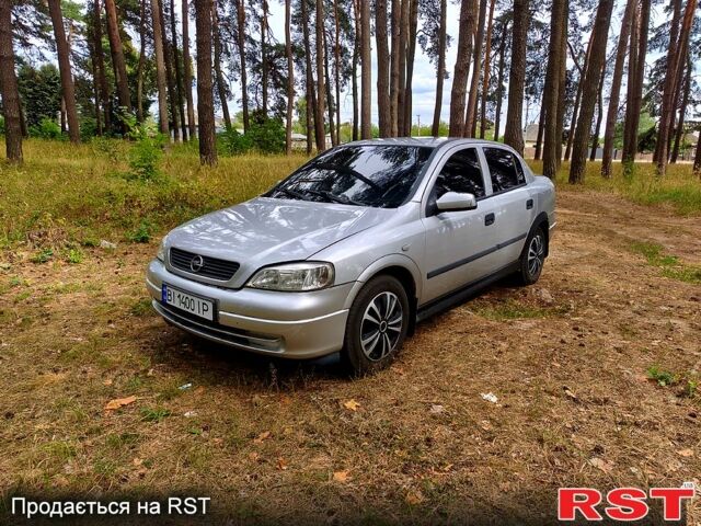 Серый Опель Астра, объемом двигателя 1.6 л и пробегом 248 тыс. км за 2250 $, фото 1 на Automoto.ua