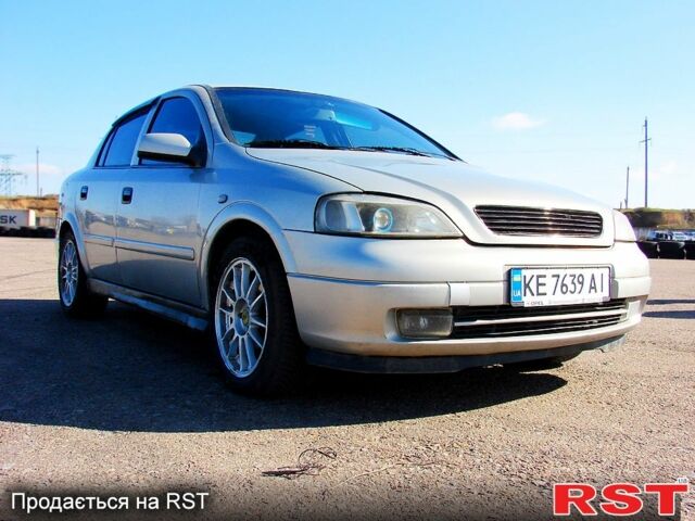 Серый Опель Астра, объемом двигателя 1.4 л и пробегом 260 тыс. км за 2100 $, фото 1 на Automoto.ua