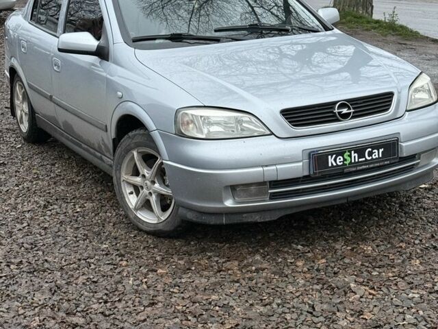 Серый Опель Астра, объемом двигателя 1.6 л и пробегом 256 тыс. км за 4200 $, фото 1 на Automoto.ua