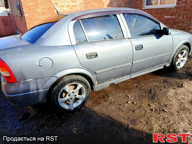 Серый Опель Астра, объемом двигателя 1.4 л и пробегом 315 тыс. км за 2600 $, фото 1 на Automoto.ua