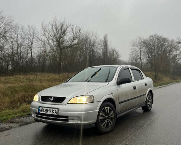 Серый Опель Астра, объемом двигателя 1.39 л и пробегом 223 тыс. км за 3800 $, фото 1 на Automoto.ua