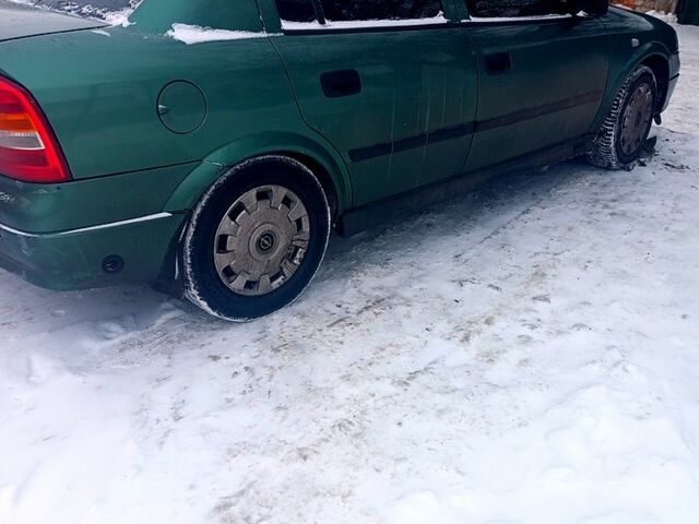 Серый Опель Астра, объемом двигателя 1.4 л и пробегом 270 тыс. км за 4500 $, фото 1 на Automoto.ua