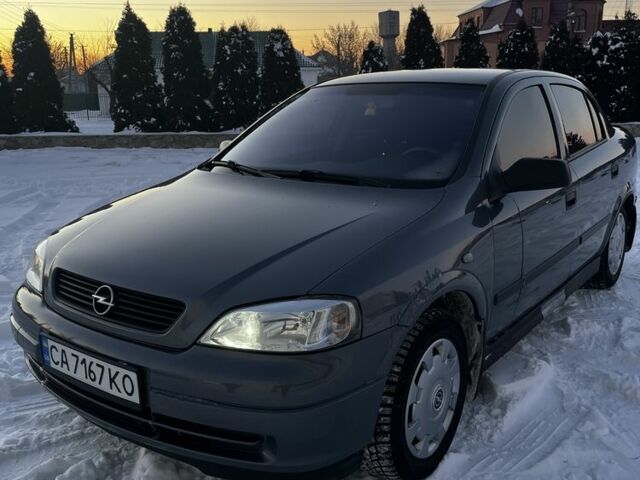 Серый Опель Астра, объемом двигателя 1.6 л и пробегом 90 тыс. км за 5000 $, фото 1 на Automoto.ua