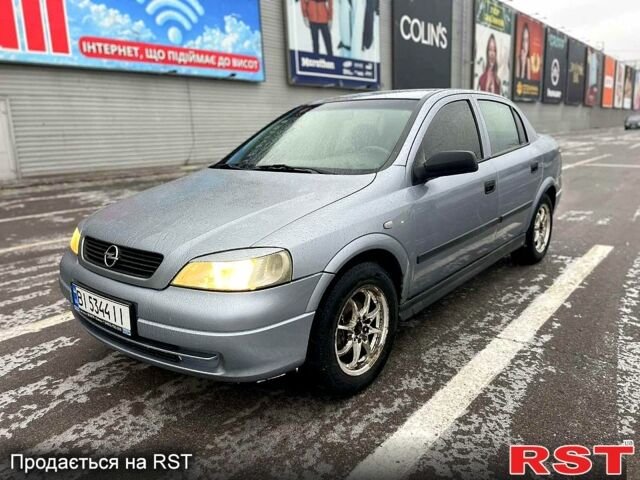 Серый Опель Астра, объемом двигателя 1.4 л и пробегом 25000 тыс. км за 3200 $, фото 1 на Automoto.ua