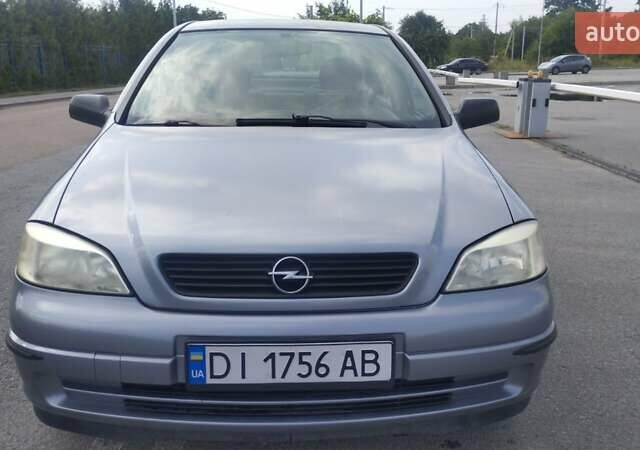Серый Опель Астра, объемом двигателя 1.39 л и пробегом 145 тыс. км за 3900 $, фото 1 на Automoto.ua