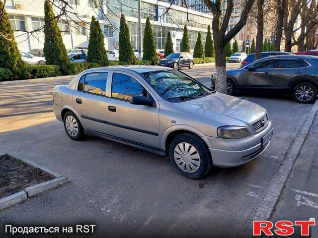 Серый Опель Астра, объемом двигателя 1.4 л и пробегом 380 тыс. км за 2900 $, фото 1 на Automoto.ua