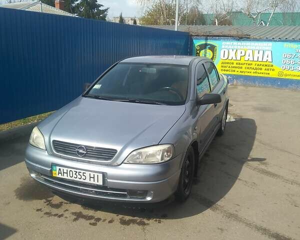 Серый Опель Астра, объемом двигателя 1.4 л и пробегом 278 тыс. км за 4000 $, фото 1 на Automoto.ua