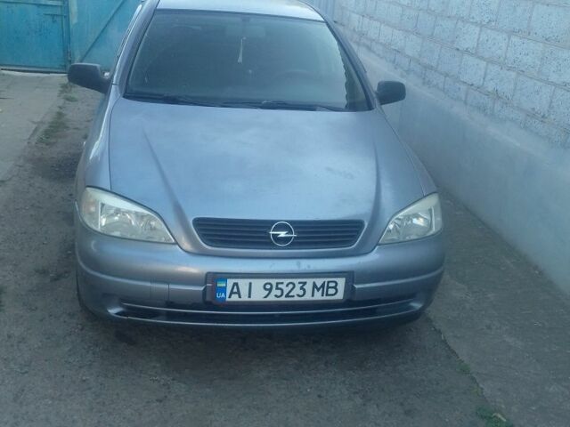 Серый Опель Астра, объемом двигателя 1.4 л и пробегом 230 тыс. км за 2800 $, фото 1 на Automoto.ua