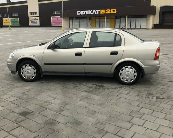 Серый Опель Астра, объемом двигателя 1.39 л и пробегом 112 тыс. км за 5500 $, фото 1 на Automoto.ua