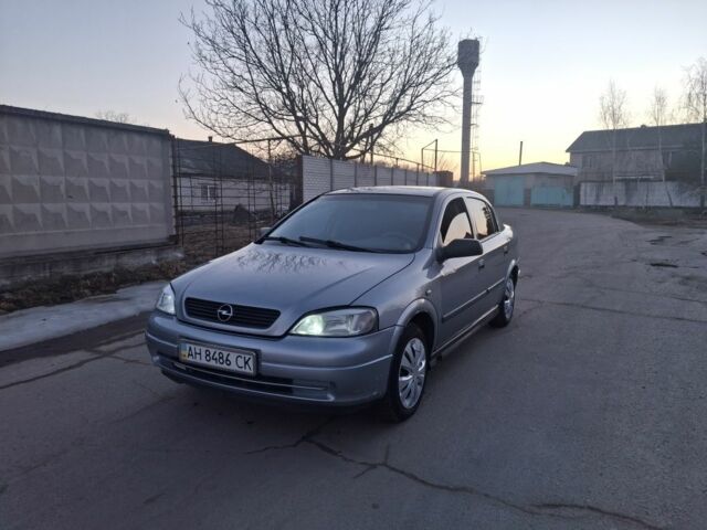 Серый Опель Астра, объемом двигателя 1.4 л и пробегом 200 тыс. км за 1650 $, фото 1 на Automoto.ua