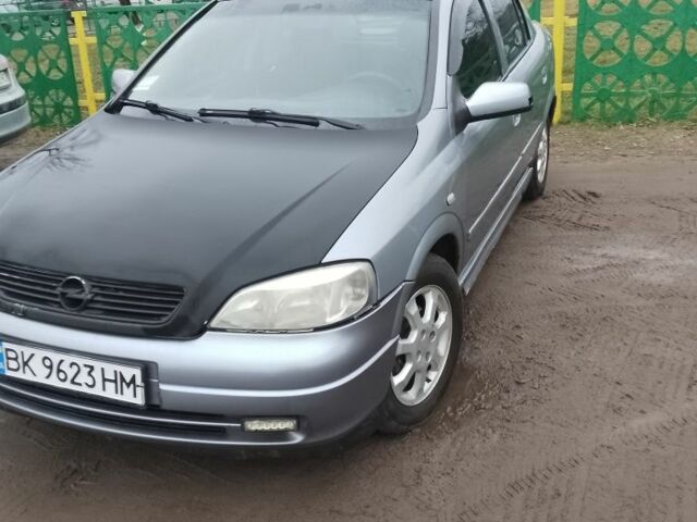 Серый Опель Астра, объемом двигателя 1.4 л и пробегом 290 тыс. км за 2400 $, фото 1 на Automoto.ua