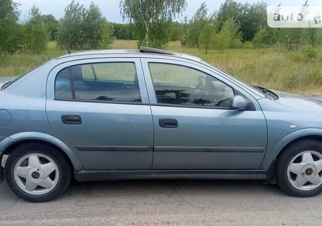 Серый Опель Астра, объемом двигателя 1.6 л и пробегом 220 тыс. км за 3300 $, фото 1 на Automoto.ua