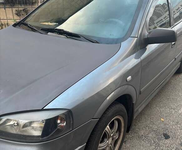 Серый Опель Астра, объемом двигателя 1.6 л и пробегом 173 тыс. км за 4000 $, фото 1 на Automoto.ua