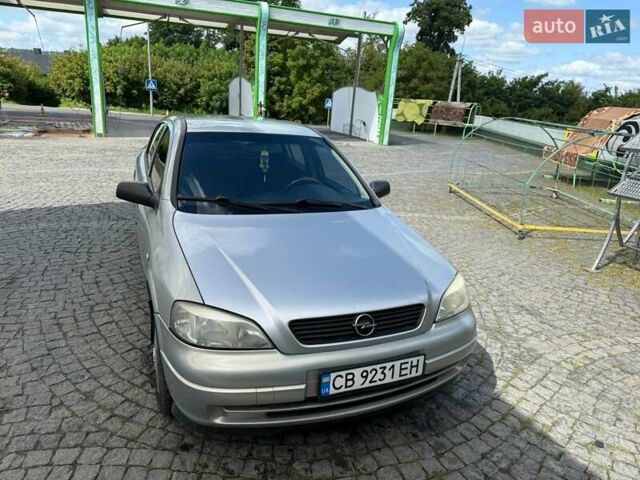 Серый Опель Астра, объемом двигателя 1.4 л и пробегом 211 тыс. км за 3200 $, фото 1 на Automoto.ua