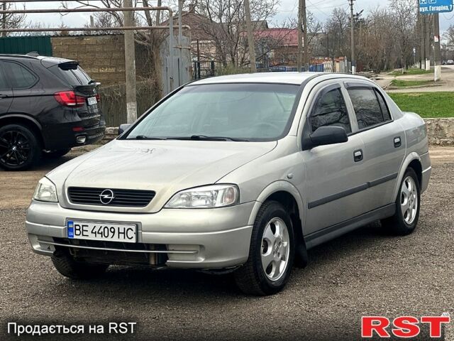 Серый Опель Астра, объемом двигателя 1.4 л и пробегом 250 тыс. км за 2999 $, фото 1 на Automoto.ua