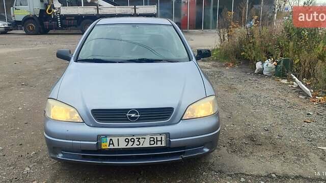 Серый Опель Астра, объемом двигателя 1.4 л и пробегом 250 тыс. км за 3000 $, фото 1 на Automoto.ua