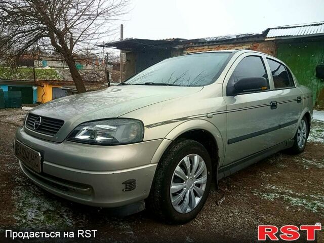 Серый Опель Астра, объемом двигателя 1.6 л и пробегом 250 тыс. км за 2600 $, фото 1 на Automoto.ua