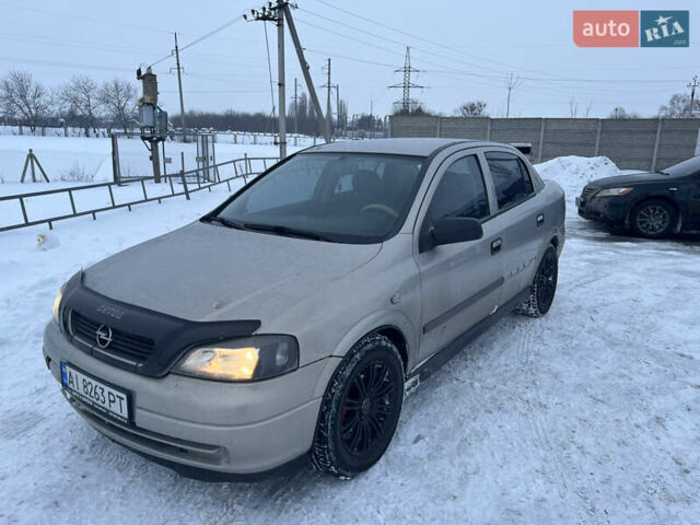 Серый Опель Астра, объемом двигателя 1.4 л и пробегом 300 тыс. км за 2150 $, фото 1 на Automoto.ua