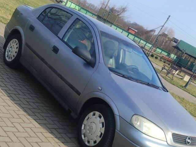 Серый Опель Астра, объемом двигателя 1.4 л и пробегом 271 тыс. км за 3400 $, фото 1 на Automoto.ua