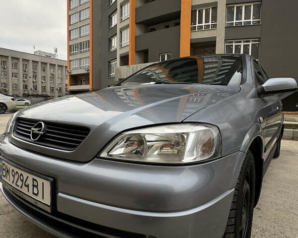 Серый Опель Астра, объемом двигателя 1.6 л и пробегом 113 тыс. км за 5500 $, фото 1 на Automoto.ua