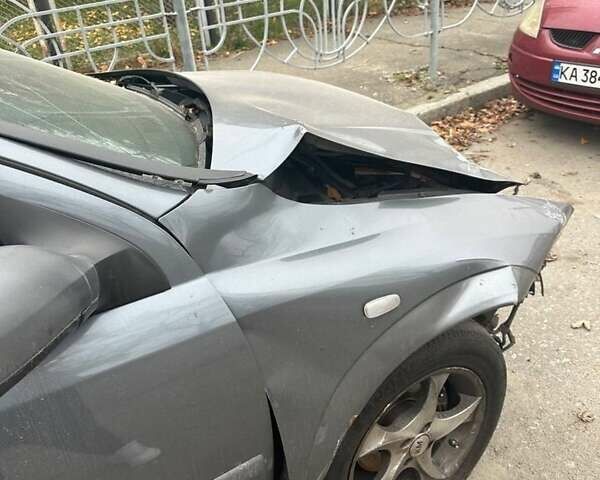 Серый Опель Астра, объемом двигателя 1.4 л и пробегом 410 тыс. км за 2000 $, фото 1 на Automoto.ua