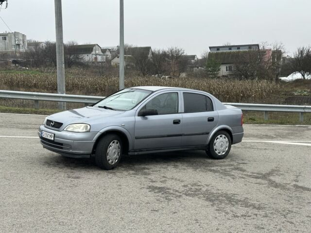 Серый Опель Астра, объемом двигателя 1.4 л и пробегом 137 тыс. км за 2850 $, фото 1 на Automoto.ua