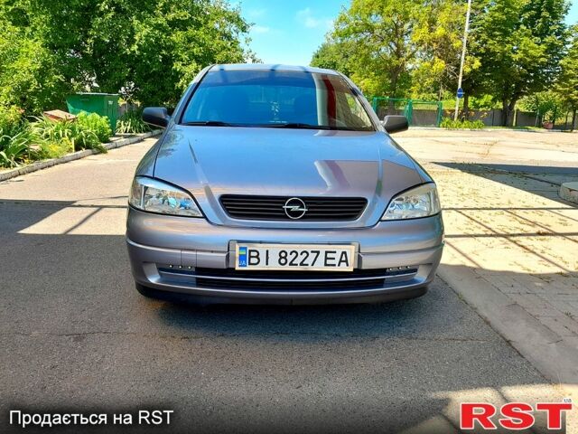 Сірий Опель Астра, об'ємом двигуна 1.4 л та пробігом 245 тис. км за 4200 $, фото 1 на Automoto.ua
