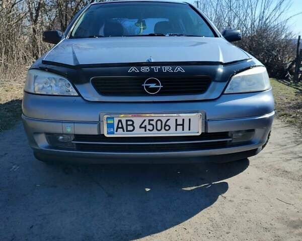 Серый Опель Астра, объемом двигателя 1.4 л и пробегом 213 тыс. км за 3700 $, фото 1 на Automoto.ua