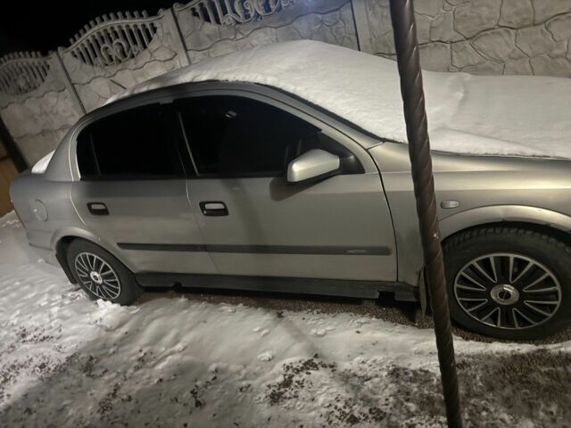 Серый Опель Астра, объемом двигателя 1.4 л и пробегом 220 тыс. км за 3021 $, фото 1 на Automoto.ua