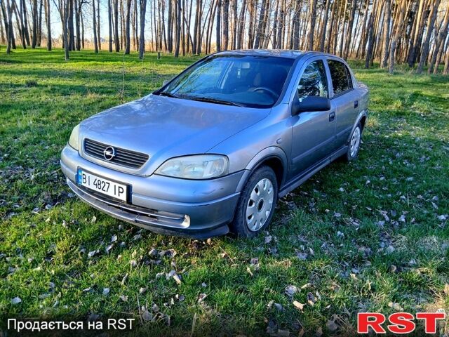 Серый Опель Астра, объемом двигателя 1.4 л и пробегом 280 тыс. км за 1600 $, фото 1 на Automoto.ua