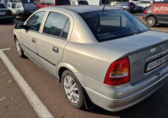 Серый Опель Астра, объемом двигателя 1.6 л и пробегом 86 тыс. км за 4500 $, фото 1 на Automoto.ua