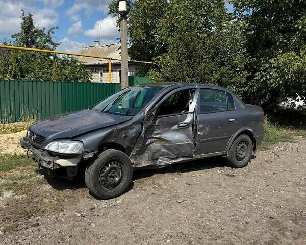 Серый Опель Астра, объемом двигателя 1.4 л и пробегом 122 тыс. км за 1500 $, фото 1 на Automoto.ua