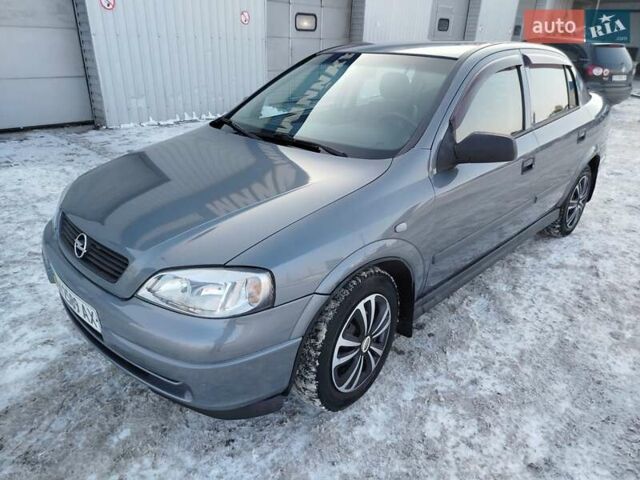 Серый Опель Астра, объемом двигателя 1.39 л и пробегом 224 тыс. км за 3750 $, фото 1 на Automoto.ua