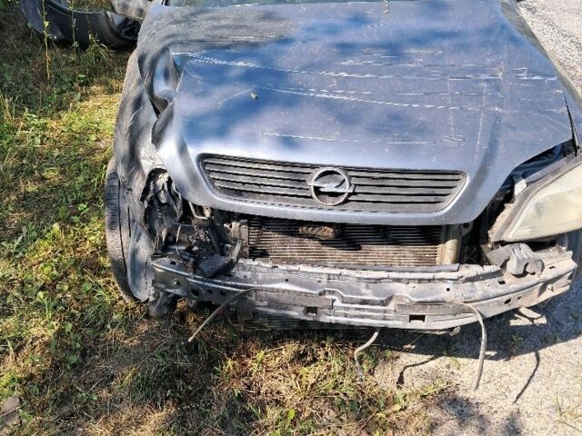 Серый Опель Астра, объемом двигателя 0 л и пробегом 135 тыс. км за 1000 $, фото 1 на Automoto.ua